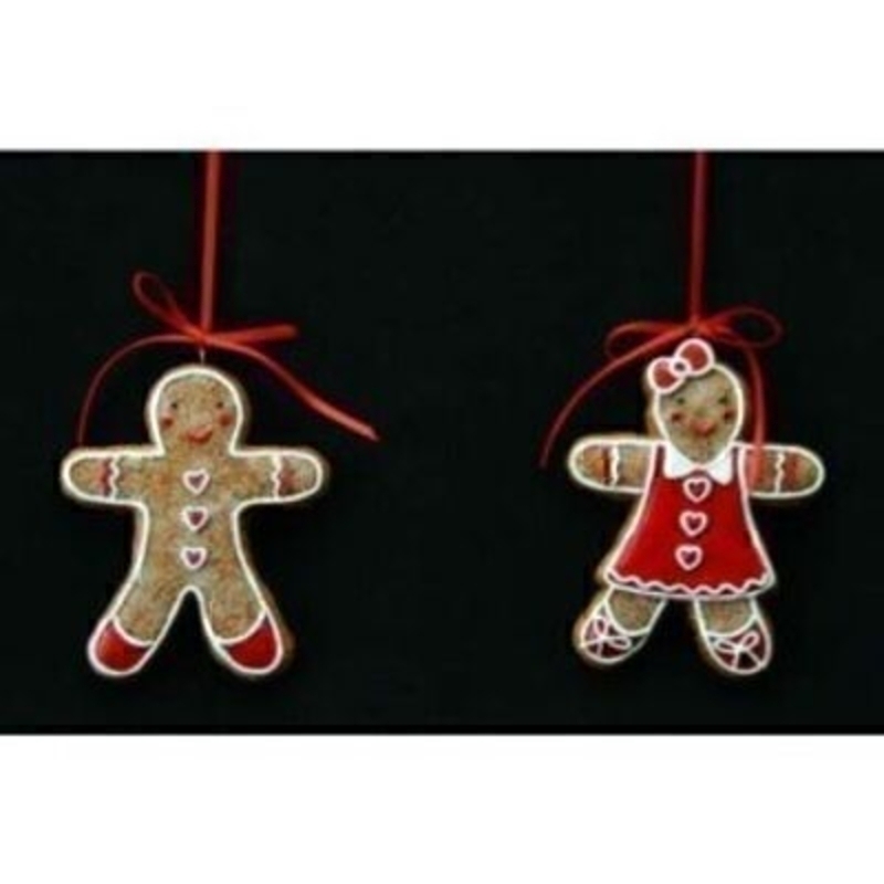 Choice of festive Gingerbread Man or Woman hanging Christmas Tree Decoration by the designer Gisela Graham. Made from Resin with red and white icing design decoration with a red ribbon to hang. A fun festive Christmas decoration to suit any theme. Size 9x6.5<br><br>
Gisela Graham Gingerbread man Christmas Decorations are really beautiful and there are lot of gorgeous designs to choose from Christmas Tree Decorations, Bags, stockings and ornaments there really is something for everyone. If you love Gingerbread men you will love lots of what Gisela Graham has to offer.<br><br>
If it is Christmas Tree Decorations to be sent anywhere in the UK you are after than look no further than Booker Flowers and Gifts Liverpool UK. Our Tree Decorations are specially selected from across a range of suppliers. This way we can bring you the very best of what is available in Tree Decorations.<br><br>
Gisela loves Christmas Gisela Graham Limited is one of Europes leading giftware design companies. Gisela made her name designing exquisite Christmas and Easter decorations. However she has now turned her creative design skills to designing pretty things for your kitchen, home and garden. She has a massive range of over 4500 products of which Gisela is personally involved in the design and selection of. In their own words Gisela Graham Limited are about marking special occasions and celebrations. Such as Christmas, Easter, Halloween, birthday, Mothers Day, Fathers Day, Valentines Day, Weddings Christenings, Parties, New Babies. All those occasions which make life special are beautifully celebrated by Gisela Graham Limited.<br><br>
It is Christmas and her love of this occasion which made her company Gisela Graham Limited come to fruition. Every year she introduces completely new Christmas Collections with Unique Christmas decorations. Gisela Grahams Christmas ranges appeal to all ages and pockets.<br><br>
Gisela Graham Christmas Tree Decorations are second not none a really large collection of very beautiful items. If it is really beautiful and charming contemporary Christmas Tree Decorations you are looking for think no further than Gisela Graham.<br><br>
These Resin Gisela Graham Gingerbread Man Christmas Tree Decoration are sure to delight. They will be enjoyed for generations to come and compliment any Christmas tree decoration. It is the perfect choice for Christmas Tree Decorations. You have a choice of the man or the woman  but if you ask me I would advise you to have both they make a perfect pair. Remember Booker Flowers and Gifts for Gisela Graham Gingerbread Christmas Tree Decorations.
